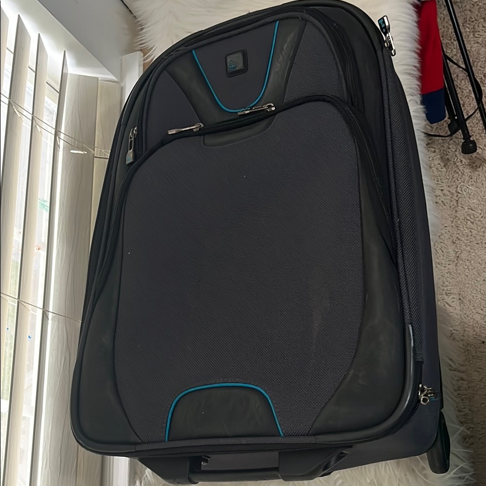 Black Suitcase with Blue Accents